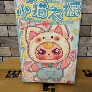 Cute Kitten Wardrobe Toy with Pink and Blue Accents